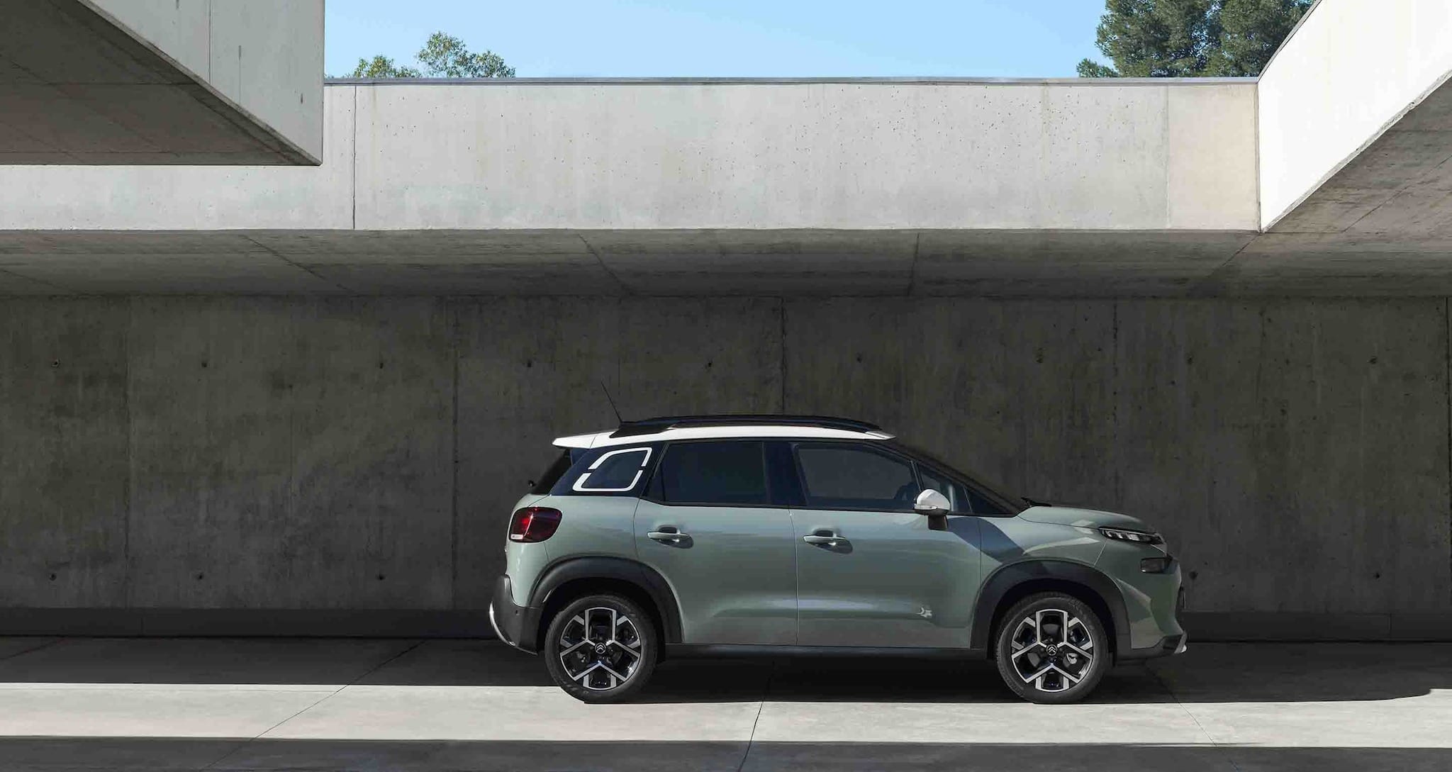 Citroen C3 Aircross side view in green color