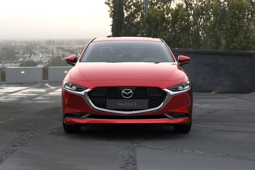 Mazda 3 Sedan front view in red color